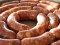 Woman charged after attacking man with Swedish sausages